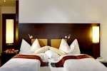 Seidenstrasse|
Hotelzimmer mit Doppelbett

