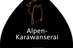 Alpen-Karawanserai, Logo mit schwarzem Hintergrund